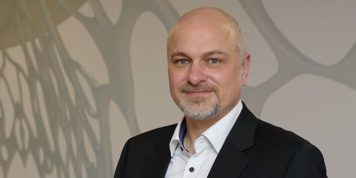 Das Bild zeigt Andreas Hillmann von Transportlogistik REWE Group