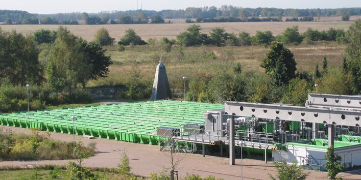 Outdoor area with green, artificial gutters among fields and meadows