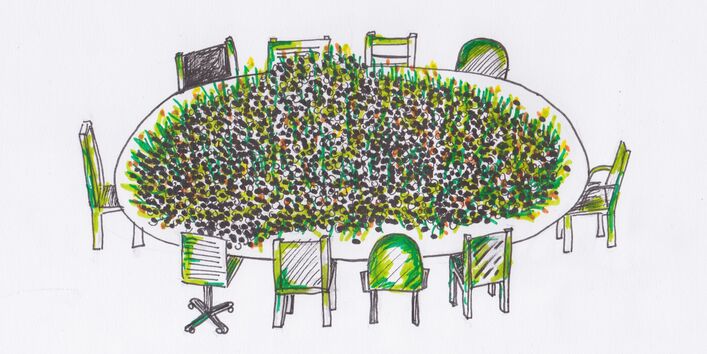 Skizze der Ausstellung zeigt einen Tisch mit zehn Stühlen, auf dem Tisch liegen unzählige Saatbälle.