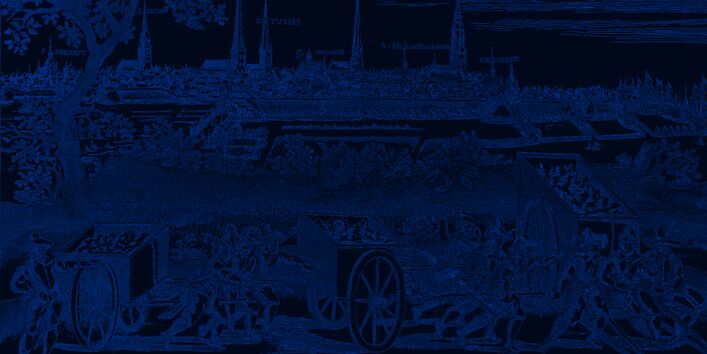 Gefangene transportieren den Müll in großen Handwagen raus aus der Stadt.