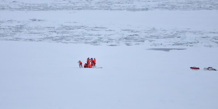 Researchers in the snow