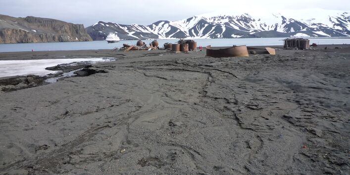 ship and old drums in the antarctic