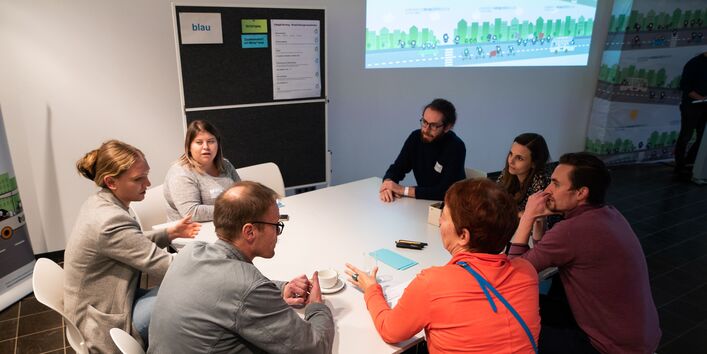 Erfahrungsaustausch und Gruppenarbeit