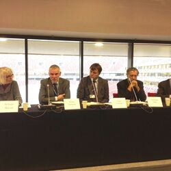 5 speaker on a podium