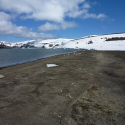 Black sand is a sign of the rock's volcanic origin