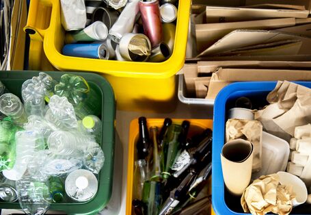 Separated packaging in the household, collected in boxes. Glass, cardboard, plastic, etc.