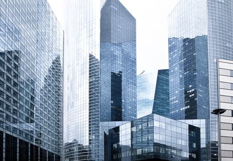 skyscrapers with glass fronts and urban canyons