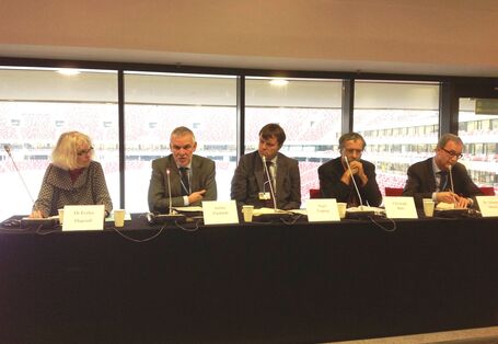 5 speaker on a podium