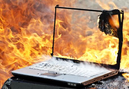 a burning laptop
