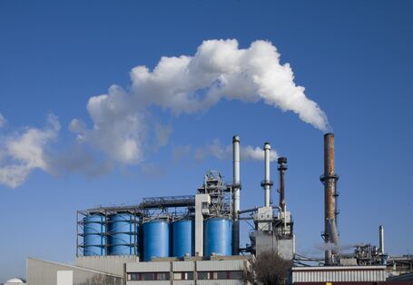 Smoking chimneys of an industrial plant