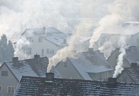 smoking chimneys over the roofs