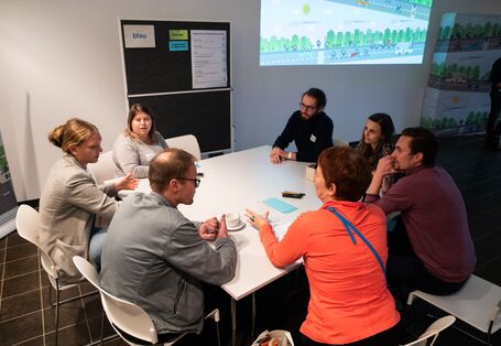 Erfahrungsaustausch und Gruppenarbeit