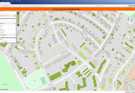 Schematische Darstellung einer Stadt von oben. Die begrünten Dächer sind in verschiedenen Grünnuancen dargestellt.