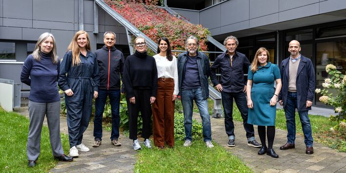 photo of the jury in front of a building