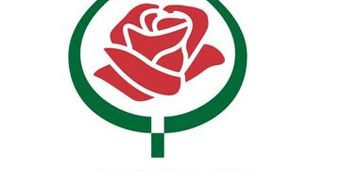 ADR-Siegel. Rote Rosenblüte in grünem Rosenblatt. Darunter der Schriftzug "ADR".