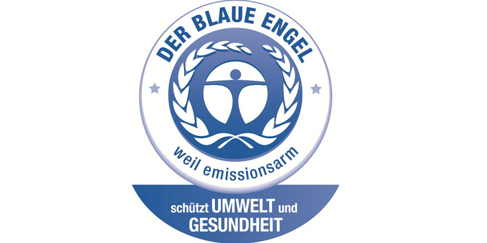ein stilisierter blauer Mensch in einem weiß-blauen Kreis mit einem beblätterten Zweig und der Aufschrift: Der Blaue Engel - weil emissionsarm - schützt Umwelt und Gesundheit
