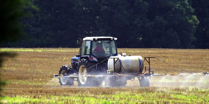 Bauer brings out pesticides in his field