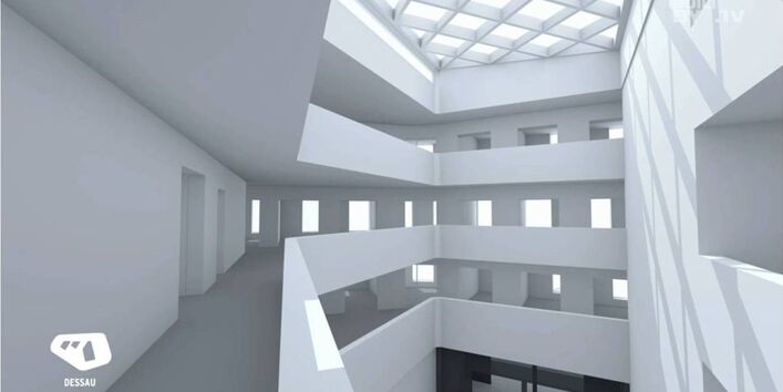 Computersimulation eines Innenhofes. Auf mehreren Etagen laufen umlaufend Gänge, von denen nachb außen Räume abgehen. Das Dach des Innenhofes ist verglast.