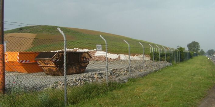 Leafy landfill, fenced