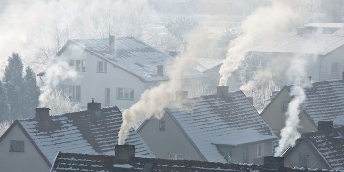 smoking chimneys over the roofs