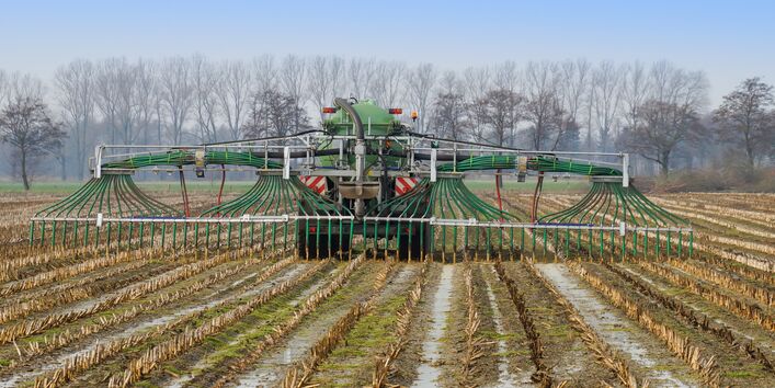 Traktor mit Schleppschlauch
