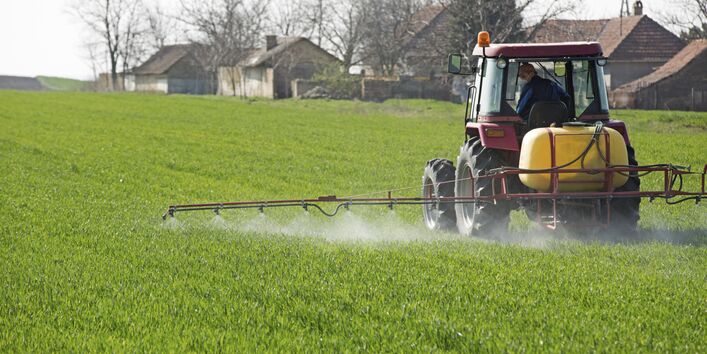 Tractor sprays plant protection products