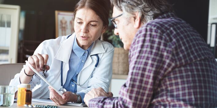 Photo of a consultation between a doctor and a patient